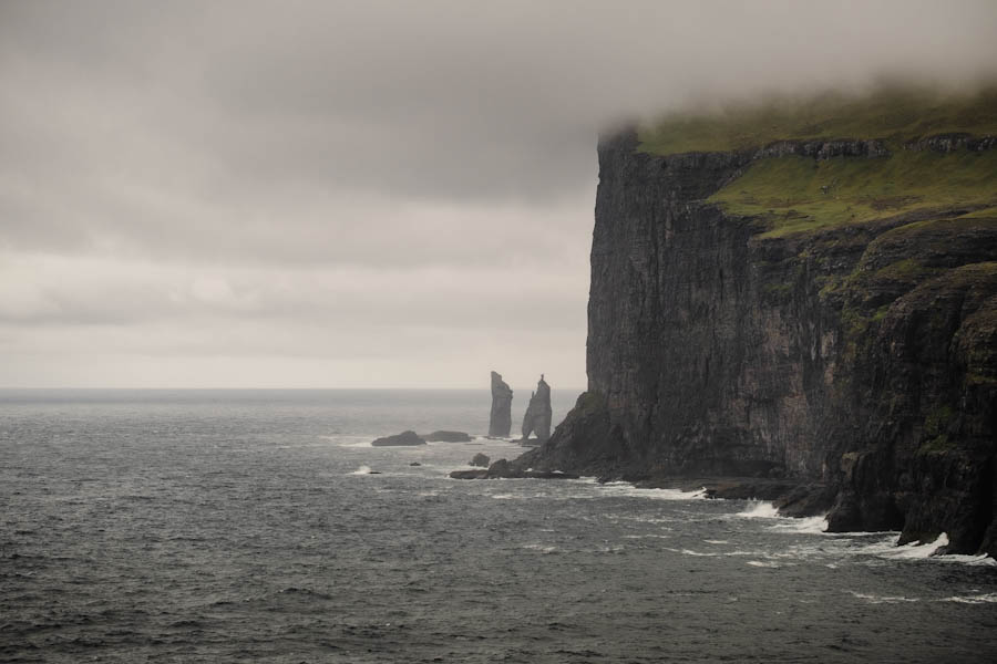 Risin og Kellingin view from Tjornuvik with bad weather Faroe Islands travelinmypocket